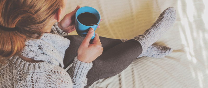 warm-comfortable-female-with-warm-drink