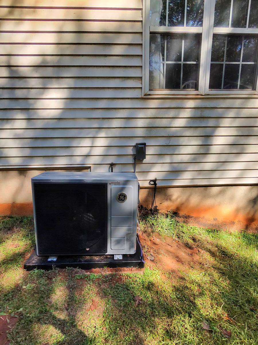 GE side-discharge heat pump installed by American Comfort in Hoschton, GA